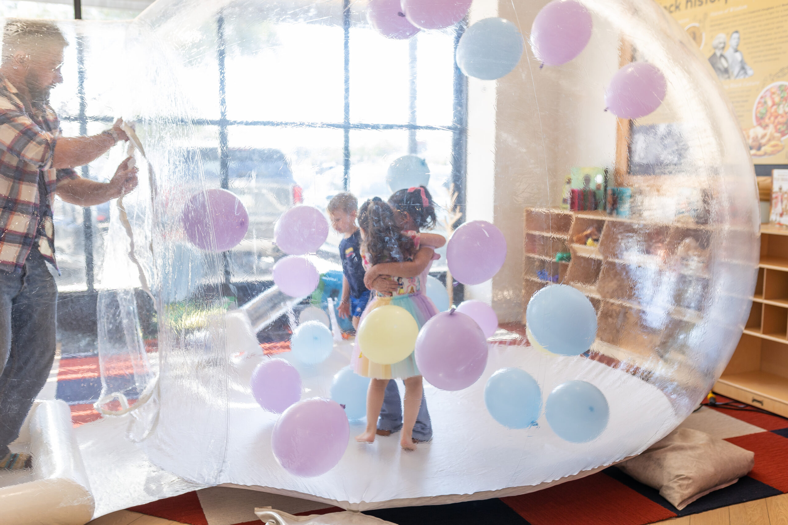 Magical Birthday Experience with custom themed backdrop and balloon garland at The Little Play Avenue