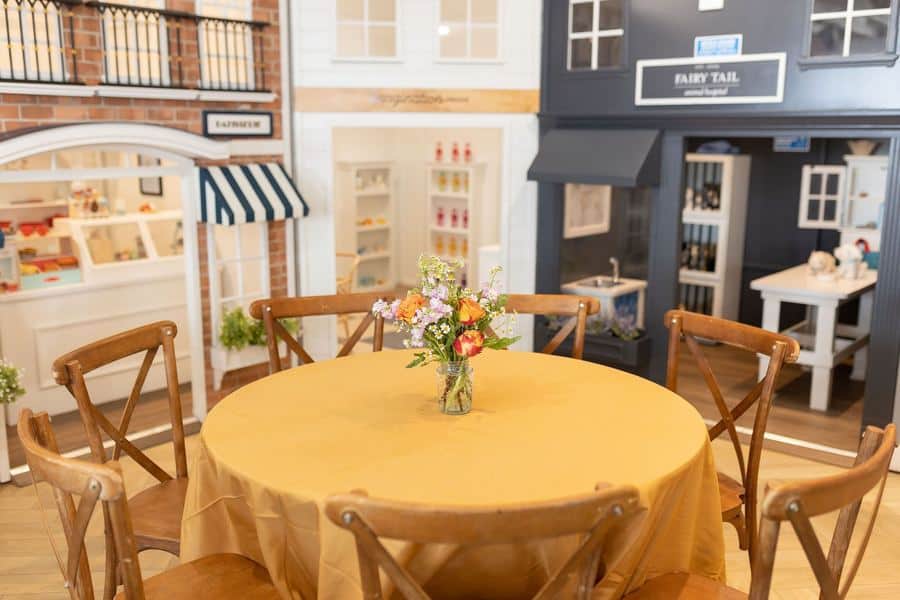 The market storefronts on the play floor